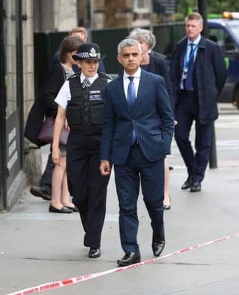 Metropolitan Police Commissioner Cressida Dick and Mayor of London Sadiq Khan visit the scene near London Bridge on Monday