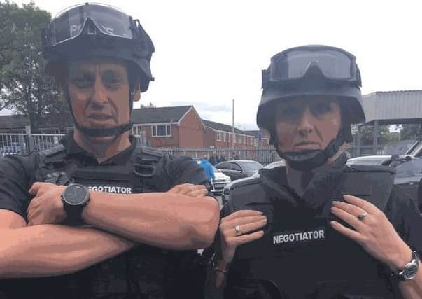 Two of the PSNI's specialist 'hostage and crisis negotiators' who assisted police in Manchester following the May 22 terror attack. Image released by PSNI.
