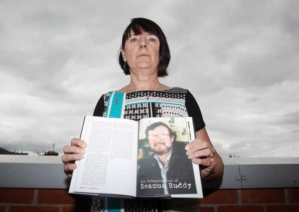 June 2013: 

Anne Morgan, sister of Seamus Ruddy, holding up a picture of her brother