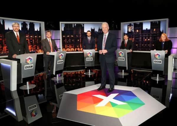 Noel Thompson chairs BBC Northern Ireland's leaders debate with panellists, from left, John O'Dowd (Sinn Fein); Sir Jeffrey Donaldson (DUP);  Colum Eastwood (SDLP); Robin Swann (UUP) and Naomi Long (ALL)