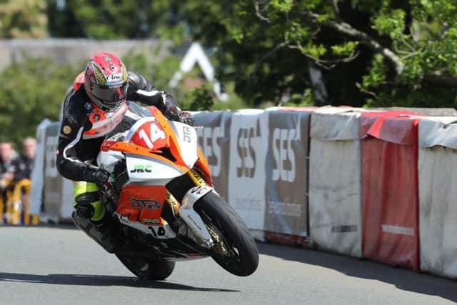 Manx rider Dan Kneen bagged his maiden TT podium with a brilliant ride to third place.