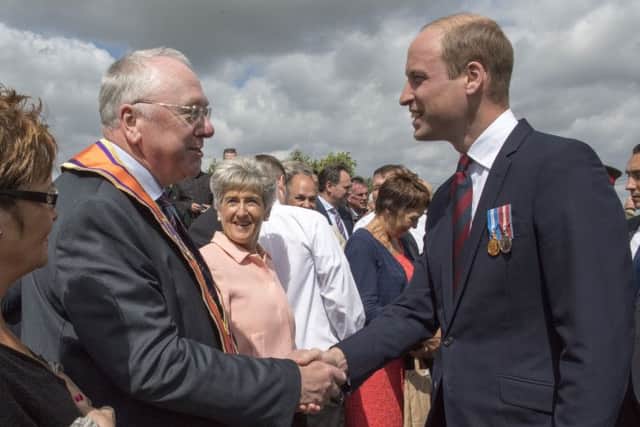 The Duke of Cambridge (right) meeting the Grand Secretary of the Orange Order Reverend Mervyn Gibson