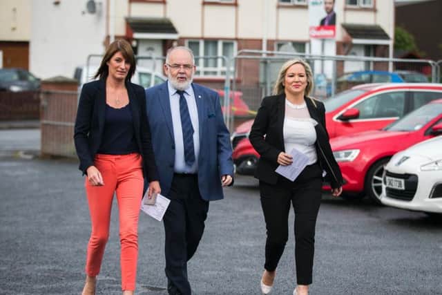 Sinn Fein leader in Northern Ireland Michelle O'Neill (right) with Westminster candidate Francis Molloy (centre) and MLA Linda Dillon (left) at St Patrick's Primary School in Clonoe, Co Tyrone before casting their votes in the 2017 General Election.