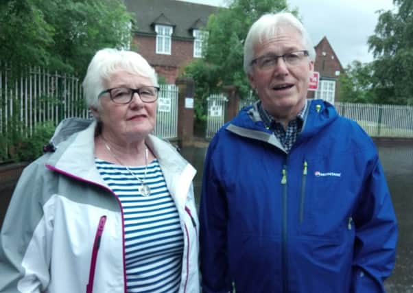 Voted Alliance: Linda Cunningham and the Rev John Cunningham (once voted unionist but after Brexit backing Alliance). He is minister of St Patrick's Church of Ireland on Templemore Ave. Pictured at Elmgrove Primary School, a voting station on the Beersbridge Road in East Belfast. Thursday June 8 2017. By Ben Lowry