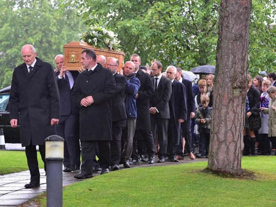 Funeral under way for Professor Johnston