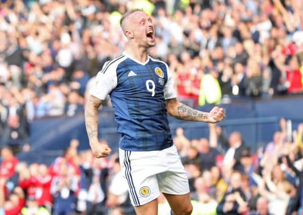 Scotland's Leigh Griffiths celebrates scoring his side's second goal of the game against England