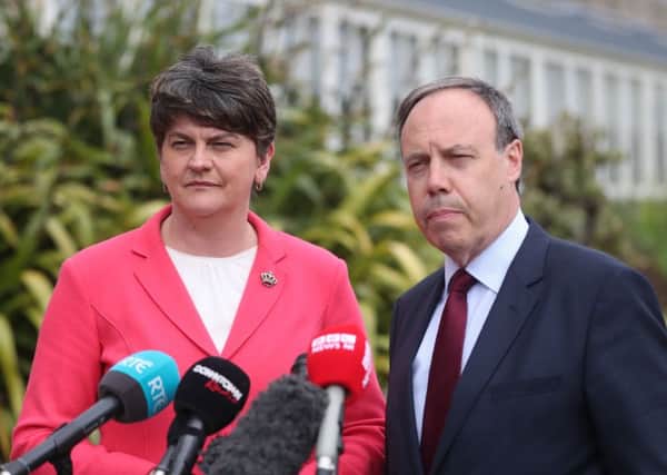 DUP leader Arlene Foster and Nigel Dodds speaks to the media at Stormont Castle in Belfast ahead of talks aimed at restoring powersharing in Northern Ireland. PRESS ASSOCIATION Photo. Picture date: Monday June 12, 2017. See PA story ULSTER Politics. Photo credit should read: Niall Carson/PA Wire
