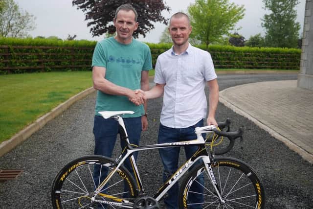 John Bann-Lavery from Clann Eirrean Cycling Club in Lurgan, receives the Trek Medone 6.9 bike which was raffled at Dunloy Cycling Club on Sunday May 28. The proceeds of the raffle went towards David McClean's Immunotherapy treatment fund. A huge thank you to all those who supported this raffle.