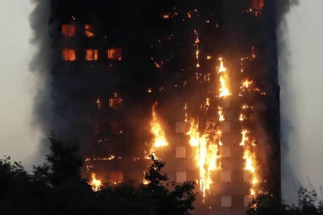 The Grenfell Tower is engulfed in flames (AP)