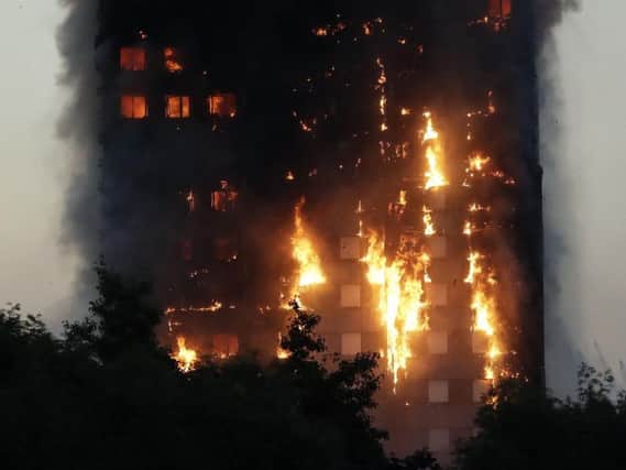 A fire engulfed the 24-storey Grenfell Tower in west London