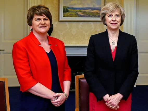 File photo dated 25/7/2016 of Arlene Foster (left), leader of the Democratic Unionist Party, with Prime Minister Theresa May