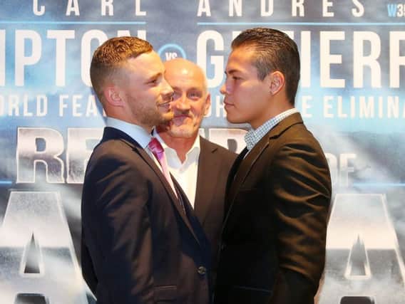 Carl Frampton faces off against Andres Gutierrez with Barry McGuigan looking on