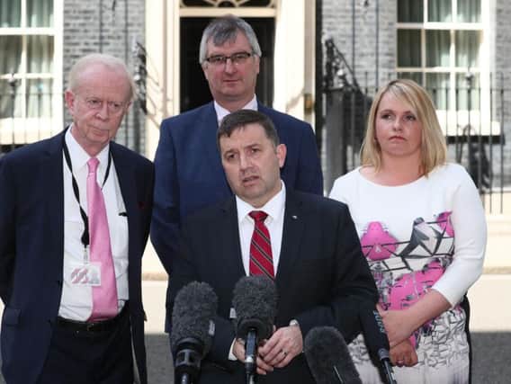 Robin Swann and other members of the Ulster Unionist Party speaking to the media after talks at 10 Downing Street, London, as negotiations continue between Theresa May's Conservatives and the Democratic Unionist Party (DUP) over a deal under which the Northern Irish party could prop up a minority Tory administration