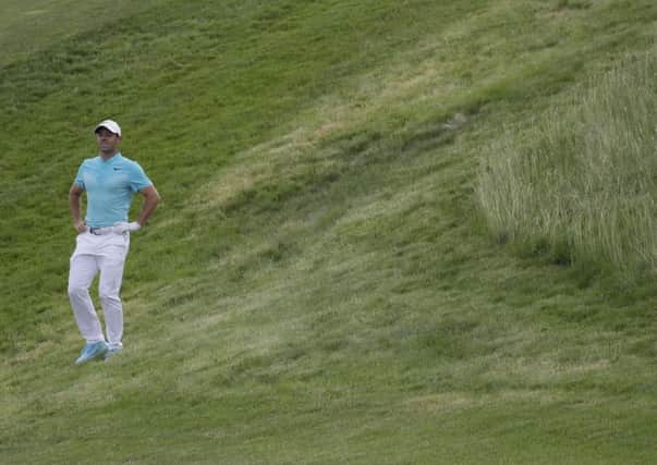 Rory McIlroy, of Ireland, looks over the 12th hole during the second round of the U.S. Open
