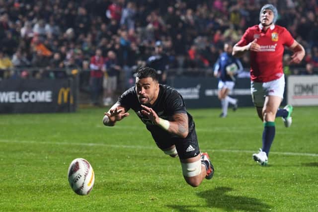 Maori All Blacks' Liam Messam scores
