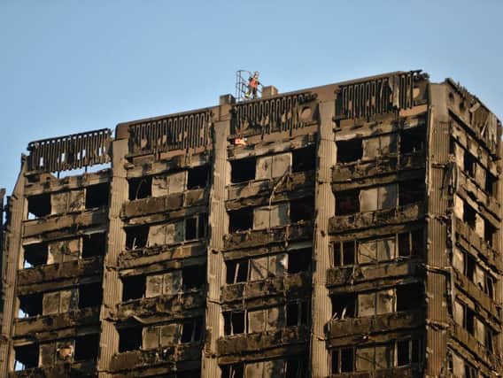 The charred remains of Grenfell Tower