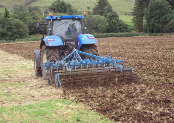 Preparing for reseeding using a heavy disc at CAFRE Hill Farm, Glenwherry