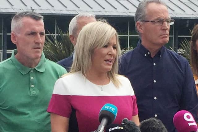 Sinn Fein leader Michelle O'Neill with party colleagues outside Stormont Castle in Belfast