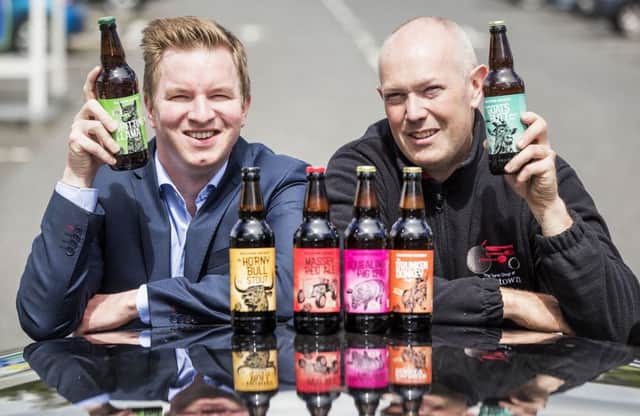 Jonathan McWhinney, buying manager at Tesco NI, left, pictured with Nigel Logan, director at Hillstown Brewery