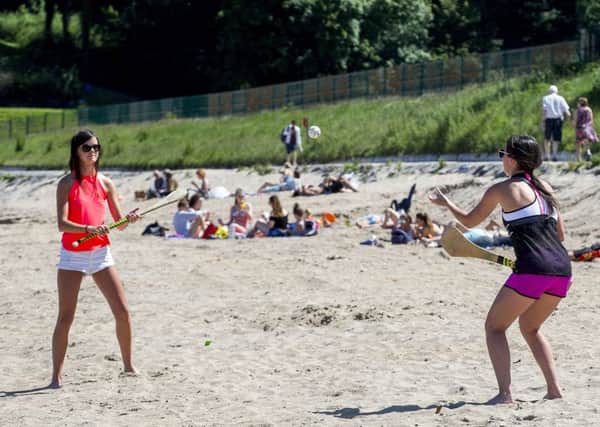 Orlagh McCollum (left) and Rachel Mulholland enjoying the weather at Crawfordsburn Country Park beach, Helen's Bay, on Tuesday June 20, just before the longest day. Photo: Liam McBurney/PA Wire
