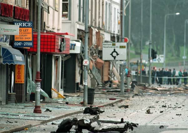The IRA terror campaign had a dire impact on the Northern Ireland economy. Above, the scene of the massive IRA car bomb in Bangor's Main Street in 1993. Picture by Pacemaker