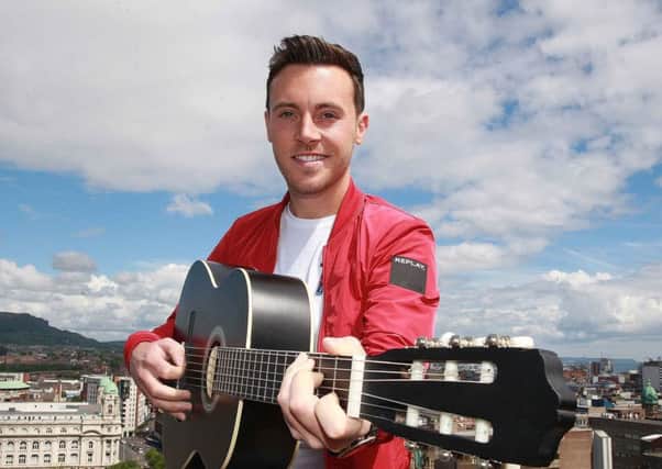 Nathan Carter on top of a belfast rooftop hotel picture Bill Smyth