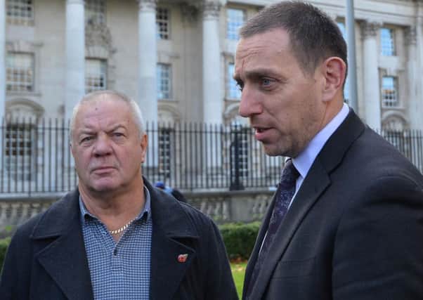 Raymond McCord, whose son was killed by the UVF in 1997,  with solicitor Paddy O'Muirigh , as senior loyalist Gary Haggarty appeared  in court charged with more than 200 terror offences last November.