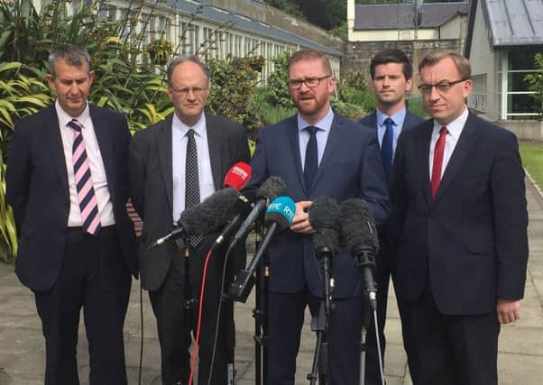 A DUP delegation, including Edwin Poots MLA (left) speaking to media at Stormont Castle, Belfast on Thursday as the talks process continues.