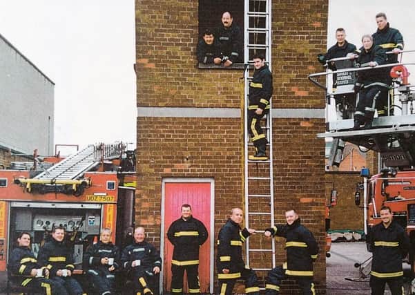 Dale (second left) during his time at Knock Fire Station in 1999