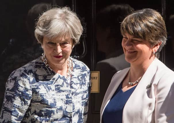 Prime Minister Theresa May and DUP leader Arlene Foster outside 10 Downing Street in London today. PRESS ASSOCIATION Photo.