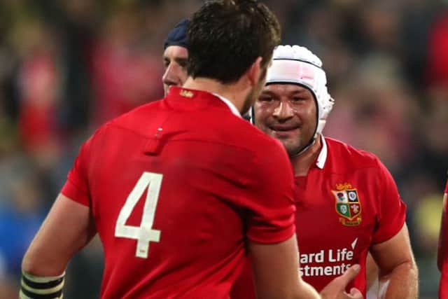 Lions' Iain Henderson celebrates with Rory Best after George North scored a try
