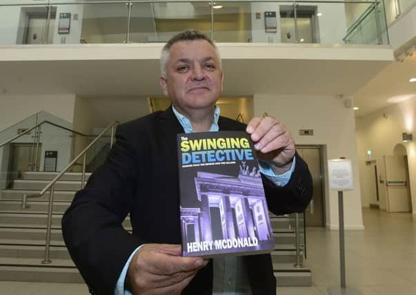 Henry McDonald with his new book The Swinging Detective, at last week's launch of the title at the Ulster Museum in Belfast