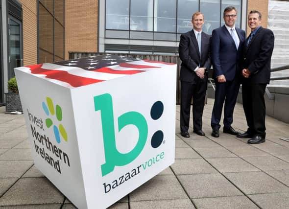 Paul Hill, director of software engineering at Bazaarvoice with Invest NI CEO Alastair Hamilton and Gary Allison, executive vice president of engineering with the Texan company setting up in Belfast