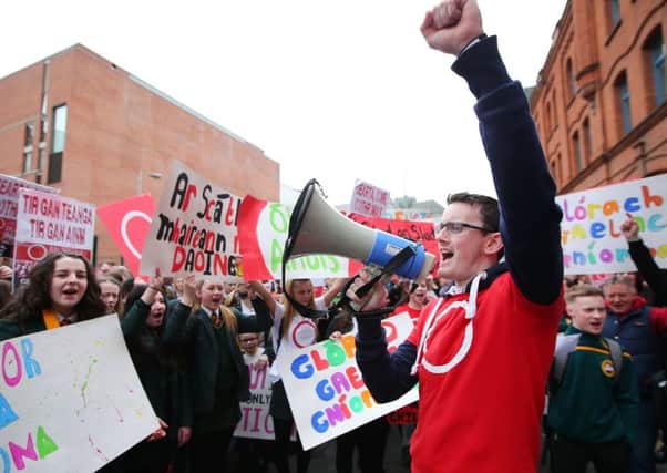 Protest0rs at a rally in Belfast earlier this year calling for the introduction of an Irish language act in Northern Ireland