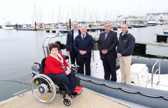 Pictured at Carrickfergus are Angela Hendra MBE, Disability Sport NI, Kevin O'Neill, Disability Sport NI, Robert Heyburn, Department for Communities, Paul Bunting, Belfast Lough Sailability and John News, Sport NI.
