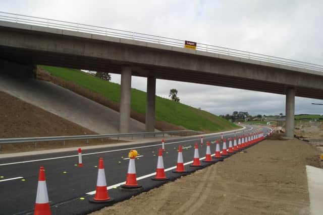 The newly completed A1 dual carriageway past Newry on the Belfast to Dublin route, which in 2010 replaced a very dangerous and congested road. It was built to near motorway standard