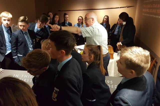 Cookstown High School pupils have aspects of Orange history explained to them