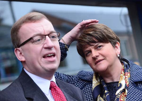 Christopher Stalford pictured with Arlene Foster in December 2016