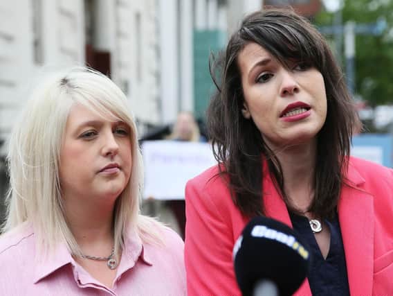 Pro-choice campaigner Sarah Ewart (left), who had to travel to England for an abortion due to fatal foetal abnormality, and Grainne Teggart of Amnesty International, speak to media outside the Royal Courts of Justice, Belfast, where the Court of Appeal allowed an appeal against a lower court's ruling that abortion legislation was incompatible with the UK's Human Rights Act