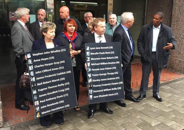 Members of the Birmingham pub bombings campaign group, Justice4the21, outside Birmingham Priory Courts on Thursday