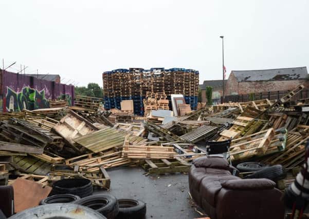 A car park in east Belfast has been closed to the public. Thousands of wooden pallets are now piled up where previously there were parked cars.
The bonfire makers are involved in a dispute with the city council over the storing of pallets.
 Photo Pacemaker Press