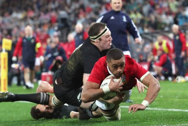 Lions Taulupe Faletau scores their first try against New Zealand