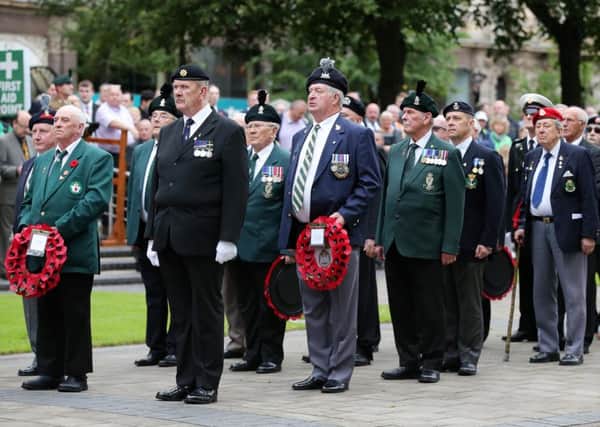 Veterans in the grounds of Belfast City Hall during the commemoration