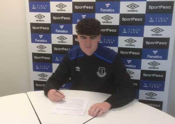 Portadown Youth's Barney McKeown signing terms with Everton on a two-year scholarship deal.