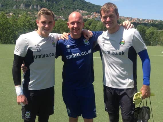 Goalkeepers Gareth Deane and Roy Carroll with coach Johnny Williamson