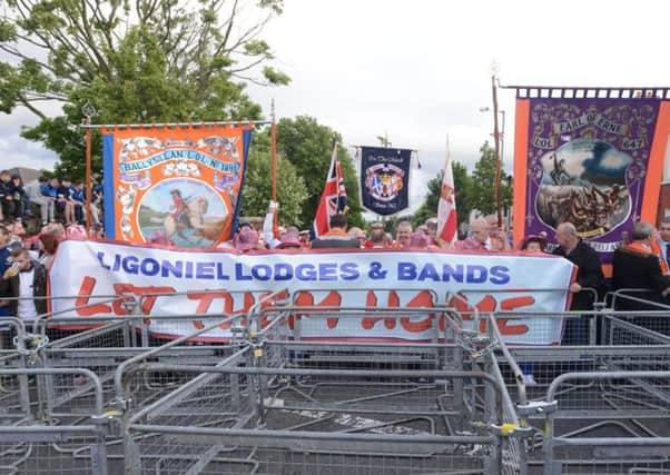 A Parades Commission ruling had prevented an Orange lodge from marching past the Ardoyne shops