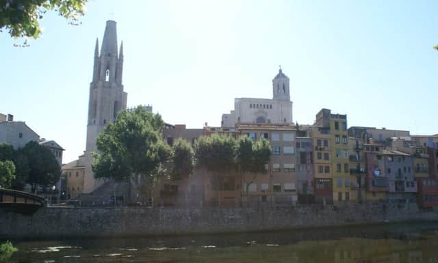 Basilica de Saint Feliu (left of picture) and Catedral de Girona seen from the River Onyar.