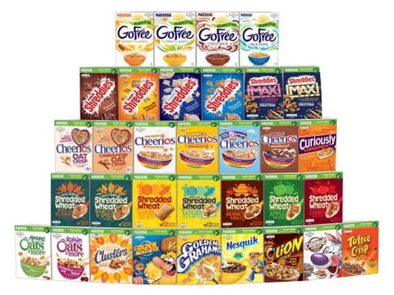 Nestle has pledged to cut sugar in its UK breakfast cereals by a further 10% by the end of next year in a move welcomed by health chiefs.