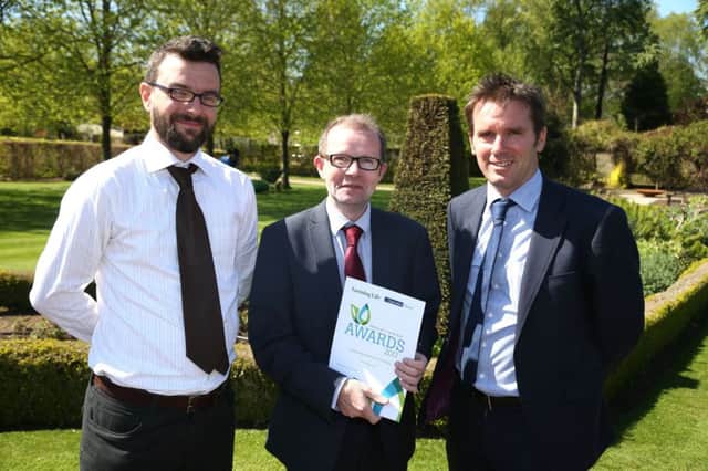 Farming Life advertising executive Tim Rea pictured with Keith Morrison, chief executive of the Health and Safety Executive Northern Ireland, and Alistair Bushe, editor of the News Letter