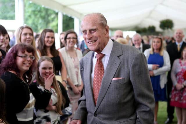 The Duke of Edinburgh attends the Presentation Reception for The Duke of Edinburgh Gold Award holders in the gardens at the Palace of Holyroodhouse in Edinburgh.